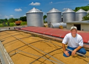 Man sitting on grain truck