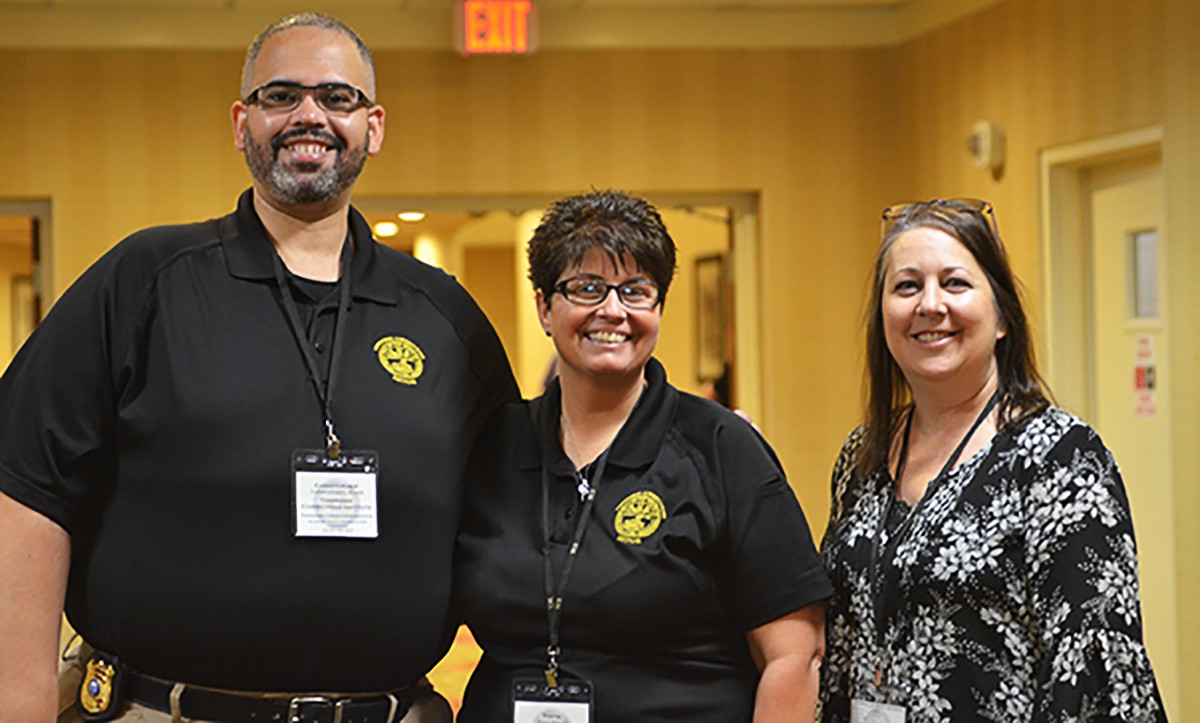 E-Content Manager of Training Christopher Allen, Chief DFM Tonya West Stacey and ASA4 Shari Scott