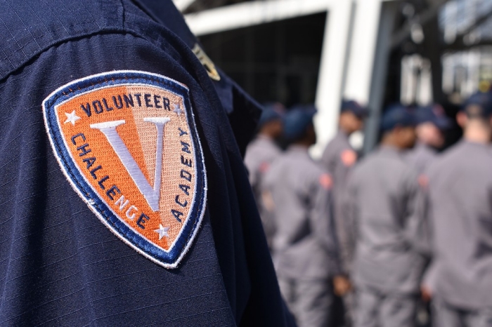 Tennessee Volunteer ChalleNGe Academy Graduation Image showing the Tennessee Volunteer ChalleNGe Academy Logo patch on shoulder sleeve of uniform