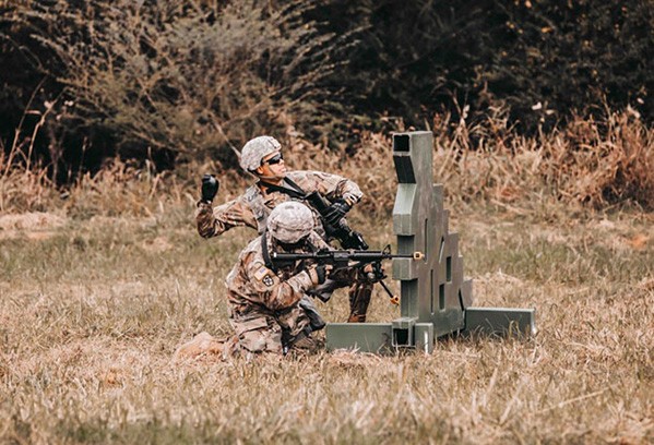 Members of the Tennessee National Guard’s 208th Area Support Medical Company move through a hand grenade qualification course, Nov. 3, at Smyrna’s Volunteer Training Site. (Photo by 1st Lt. Sarah Kohrt)